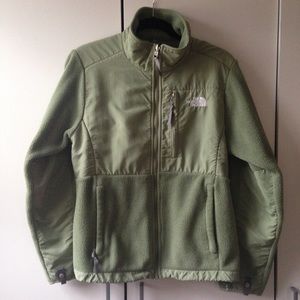 Green North Face fleece jacket.