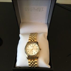 August Steiner gold watch
