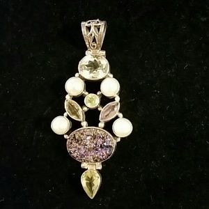 Sterling silver pendant.