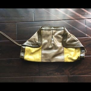 Mustard yellow and army green clutch