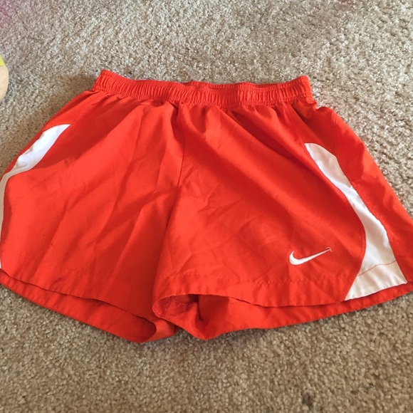 Orange Nike soccer shorts