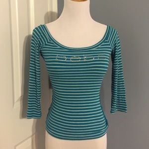 Striped turquoise bebe logo rhinestone top.