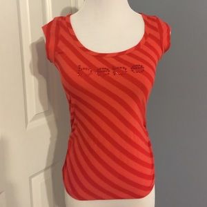 Red striped bebe rhinestone logo top.