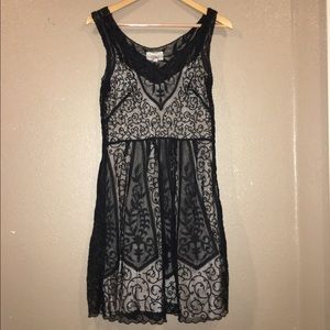 Black lace dress with peach slip