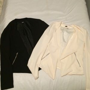pair of black and white blazers