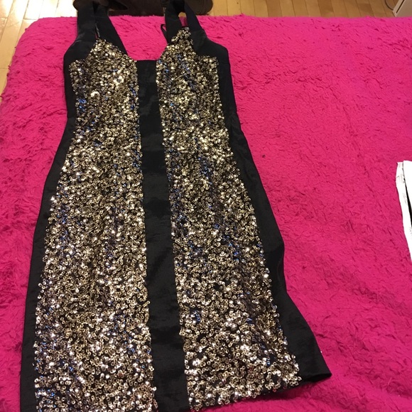 Black and gold studded party dress !