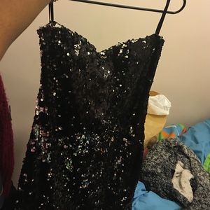Black and silver sequined dress