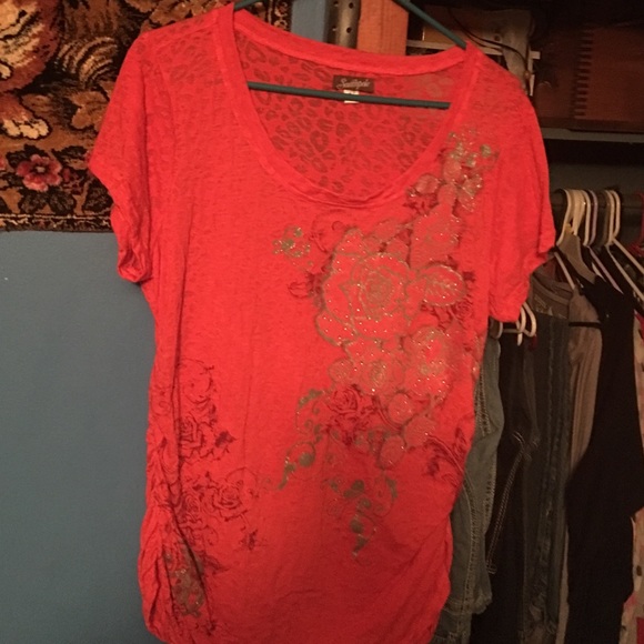 Orange Southpole shirt with glitter rose details.