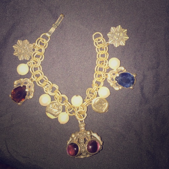 Vintage bangle bracelet with Charms hanging on it