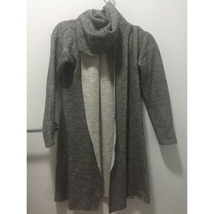 Never been worn. Grey hoodie kind sweater.