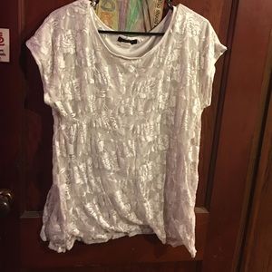 White top with lace overlay.