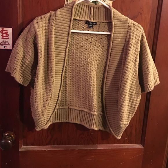 Tan shrug.