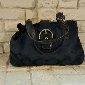 Navy colored cloth Coach handbag