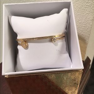 Beautiful Michael Kors two piece bracelet set.