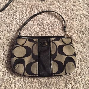Signature coach mini over the shoulder clutch