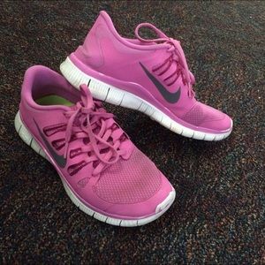 Pink Nike frees