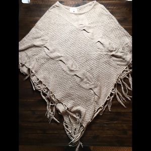 Knit poncho with fringe