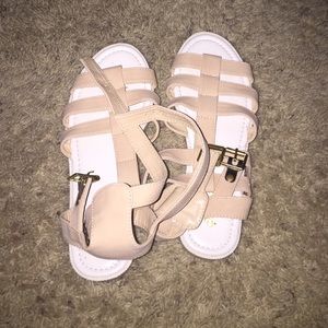 Cream colored gladiator sandals