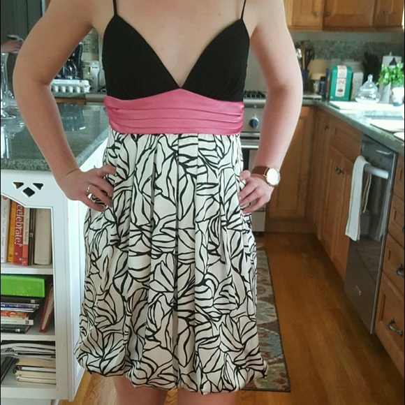 Junior size 9. patterned dress with pink band