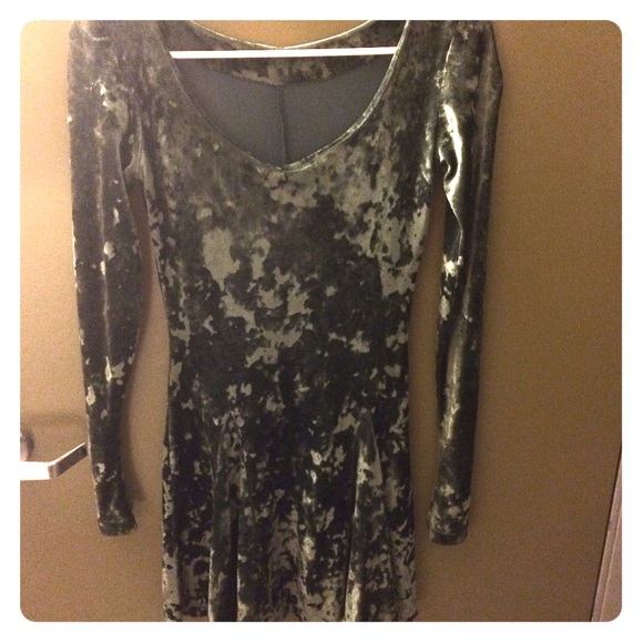 Green velvet long sleeved mini dress