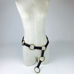 Brown adjustable belt with brass circles