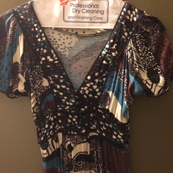 Soft, comfy faux wrap dress with button details
