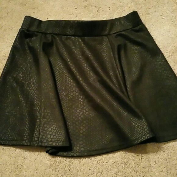 CLEARANCE - Flirty black snake skin skater skirt.