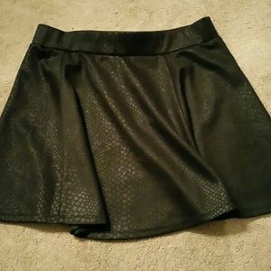 CLEARANCE - Flirty black snake skin skater skirt.
