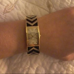 Black and gold watch