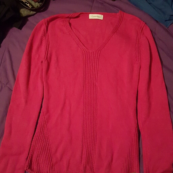 Long knitted sweater