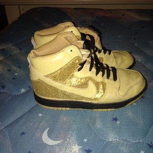 Gold Nike shoes