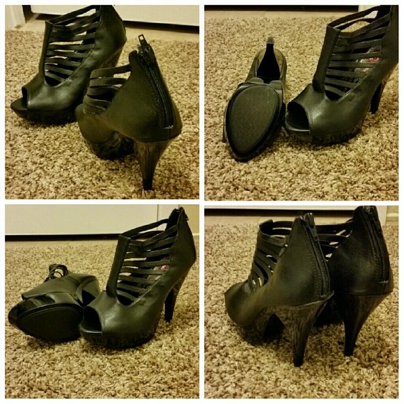 Black zip up high heels