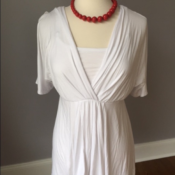Maternity and nursing top with cut out sleeves.