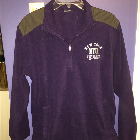 An NYU 3/4 zip pullover, size small. Never worn.