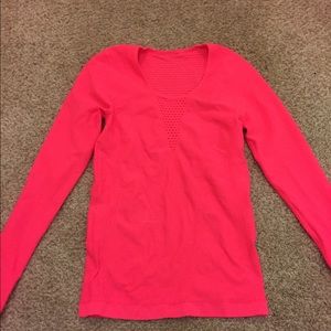 Bright pink long sleeve shirt with thumb holes