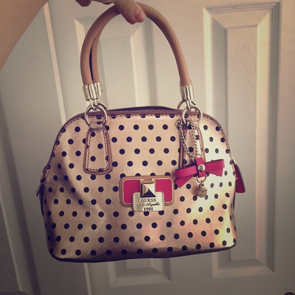 GUESS polka dot rose gold hand bag authentic