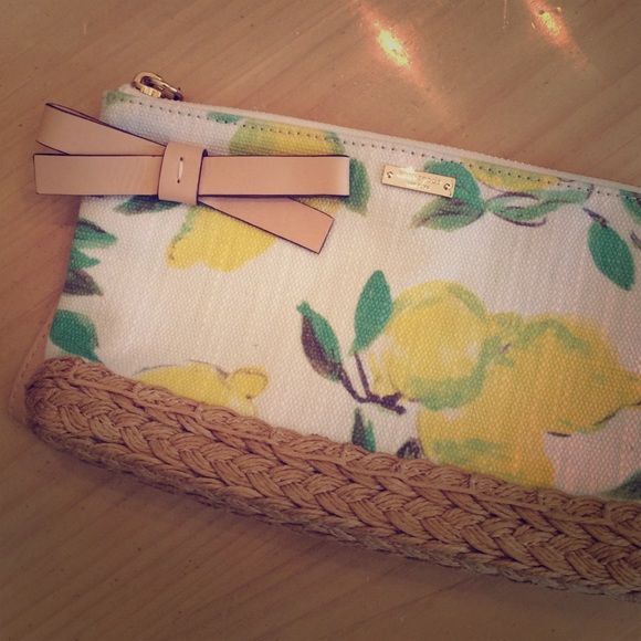 kate spade Handbags - Kate Spade Canvas Limoncello Clutch