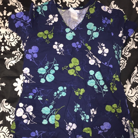 Size small scrub top with tie in the back