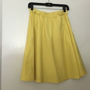 NBW Yellow skirt with pockets.