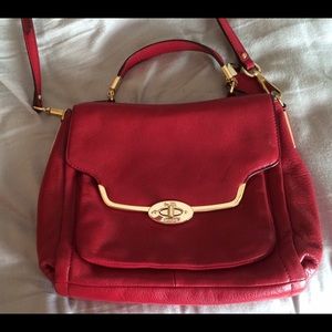 Red crossbows coach purse