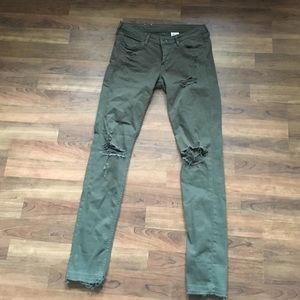 Army green ripped jeans !