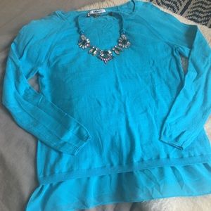 DKNY turquoise sweater with bottom trim