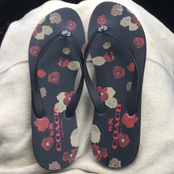 Black coach flip flops