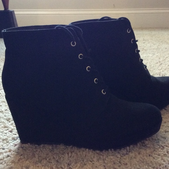 Black wedge booties