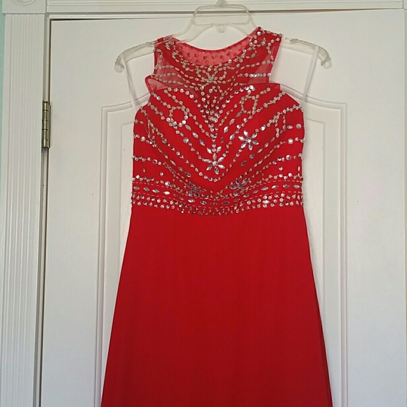 Red satin skirt with sheer overlay sequins dress.