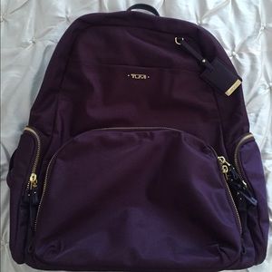 Tumi purple backpack