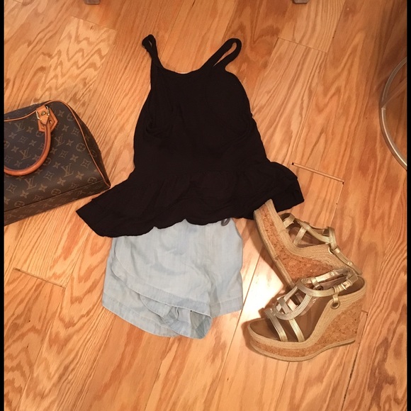 Black racerback with cropped ruffle detailing