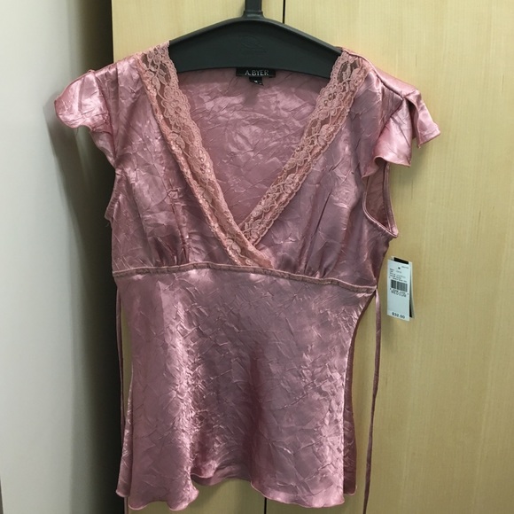 Pink-ish V-neck blouse with lace