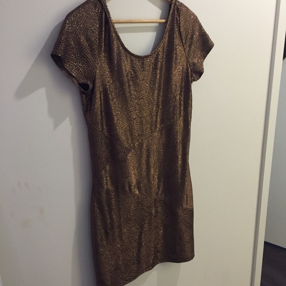 Free people gold scoop back dress.Never been worn!