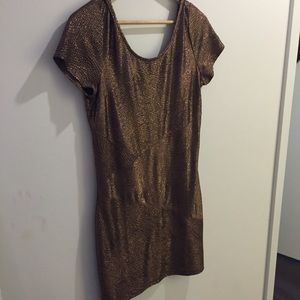 Free people gold scoop back dress.Never been worn!